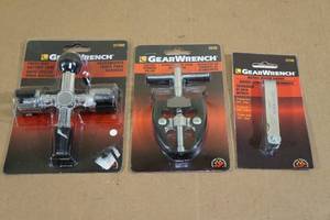 lot 66 image: Gear Wrench Three Way Battery Tool with Puller and Metric Feeler Gauge