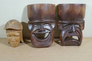 lot 200 image: Wood Carved Face Wall Hangings