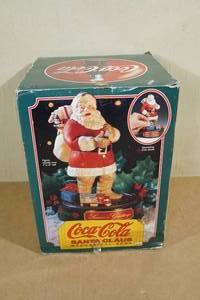 lot 205 image: Mechanical Base Coca-Cola Santa Claus Coin Bank
