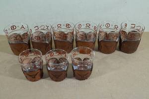 lot 212 image: Libbey Bamco Western Cattle Brand Glasses with Leather Holders