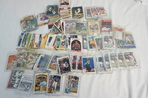 sleeved baseball cards and assortment