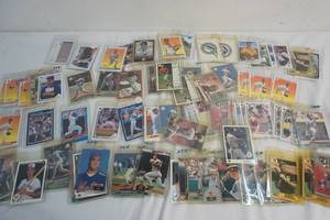 sleeved baseball cards and assortment