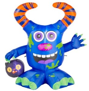 lot 6 image: Home Accents 4.5 ft. Doodle Monster with Candy Bucket Airblown Halloween Inflatable - SOLD AS IS