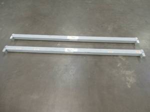 lot 826 image: (2) Teardrop Steel Racking Beams in Gray. Dimensions 96 x 3.  Used in Warehouse, In nice condition. SOLD AS IS.