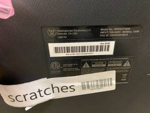 lot 1008 image: WR55UT4009 Westinghouse 55 4K Ultra HD Roku Smart TV with HDR(SOME SCRATCHES)