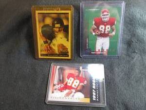 8. 3 Tony Gonzalez Rookie Cards...