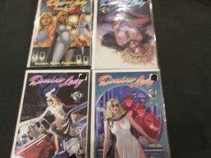 211. 4 Domino Lady Comic Books...