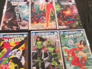 238. 6 Justice League Comic Books...