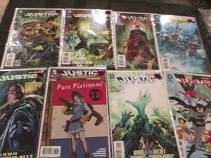 259. 8 Justice League Comic Books...