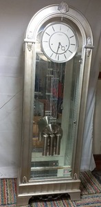 lot 5 image: Coastal Point Grandfather Clock By Howard Miller