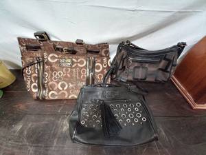 lot 140 image: Three Purses