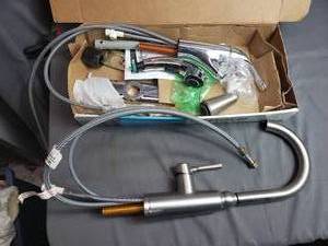 Parts and Pieces of 2 Kitchen Faucets