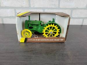 lot 1244 image: ERTL 1935 John Deere Model BR Steel Wheel Tractor - 116 Scale