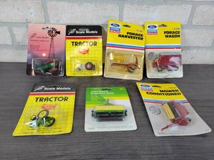 lot 1287 image: Lot of ERTL 164 Scale Implements and Tractors