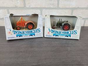 lot 1289 image: ERTL Case 500 Tractor 143 Scale Model and ERTL Massey Harris Challenger Tractor 143 Scale Model