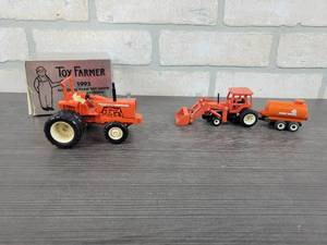 lot 1324 image: ERTL Toy Farmer Allis Chalmers two-twenty Tractor - 143 Scale from the 1995 Farm Toy Show and Deutz-Allis Loader Tractor w Wagon