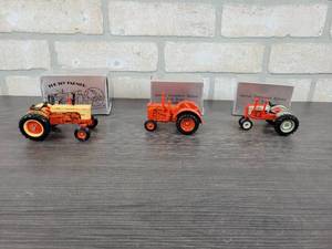 lot 1330 image: (3) National Farm Toy Show Tractors - Case-O-Matic 800, Case 500 Diesel and Ford 901 Powermaster - All are 143 Scale