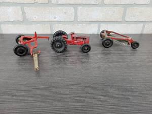 lot 1370 image: TootsieToy Tractor w Sickle Mower and Rake - Tractor is Approx. 5 Long