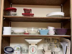 lot 72 image: Contents of Kitchen Cabinet Bowls, Glass Containers, Scale & More