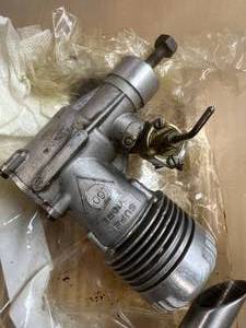 lot 103 image: Super Tigre 60 Engine & Clamp on Muffler