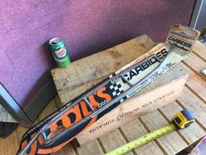 lot 73 image: Vintage Woodys Polaris Exec Executive Carbides - NOS
