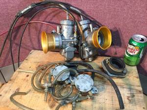 lot 177 image: Vintage Pair Larger Mikuni Carbs - Fuel Pumps - Cables - Polaris