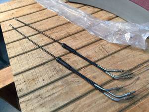 lot 205 image: 2 Vintage Polaris OEM Triple Carb Cables - NOS