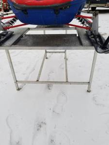 lot 56 image: Mini Snowmobile Rolling Shop Stand
