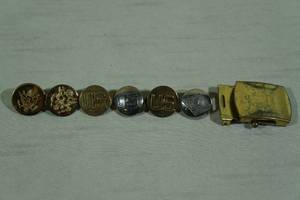 lot 193 image: Assorted US Military Pins and Buckle