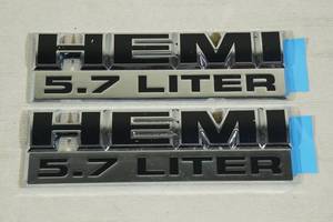 lot 196 image: NOS Hemi 5.7 Liter Badges