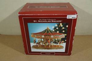 lot 79 image: The Village Collection by St. Nicholas Square Carousel Lighted Building