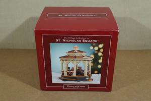 lot 80 image: The Village Collection by St. Nicholas Square Photos with Santa Lighted Building