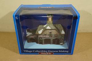 lot 83 image: Holiday Time Village Collectibles Harness Making Lighted Building