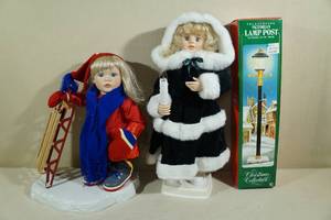 lot 121 image: 2 Christmas Dolls with Lamp Post