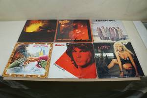 lot 173 image: Assorted Vinyl Records - Ratt, Foreigner, Lita Ford, The Doors, April Wine, Helloween