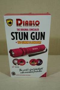 lot 178 image: NEW Diablo Stun Gun with 160 Lumen Flashlight - Pink