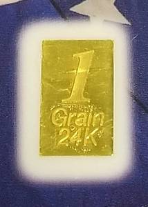 lot 06 image: 1 GRAIN GOLD PATRIOT BAR SEALED