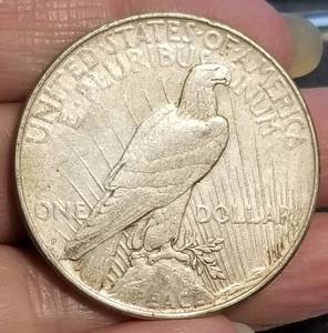 lot 12 image: 1923 US PEACE SILVER DOLLAR