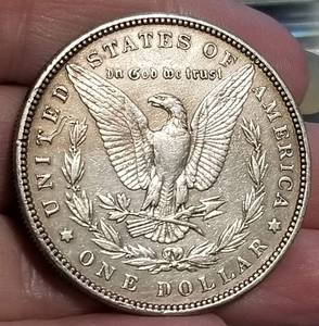 lot 13 image: 1885 MORGAN SILVER DOLLAR