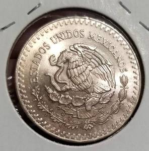 lot 41 image: 1984 MEXICO ONZA 1 TROY OZ .999 FINE SILVER