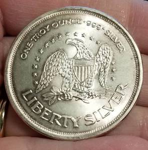 lot 63 image: 1 TROY OZ .999 FINE SILVER AMARK LIBERTY ROUND