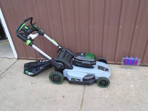 lot 112 image: New ego 60 volt self propelled mower. No battery or charger. Unable to test. No hanger for bag. As shown.