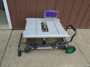 lot 114 image: Hitachi contractor saw. Wont start. No fence or miter. For parts or repair. As shown.