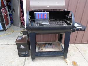 lot 116 image: Pitboss pellet grill for parts or repair. As shown.