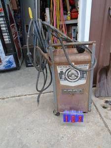lot 102 image: Twentieth century 295 amp arc welder. Very heavy. Tested & works. With cables. Bring help as we will not help load. As shown.