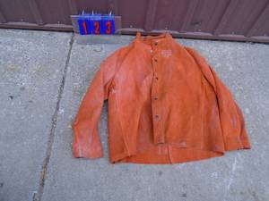 lot 123 image: New anchor Brand model 1200 leather welding coat. Fits me 2xl. As shown.