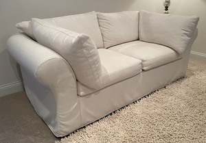lot 49 image: Pottery Barn Cream Sofa
