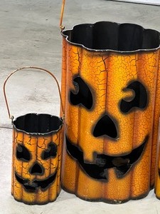 lot 161 image: Three Decorative Metal Pumpkin Candle Holders