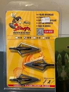 lot 142 image: NEW Stinger Buzz Cut Broadheads and Bowstring Activated On Off Switch by Nockturnal