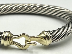 lot 13A image: David Yurman Gold Hook Sterling and 14k Cable Bracelet